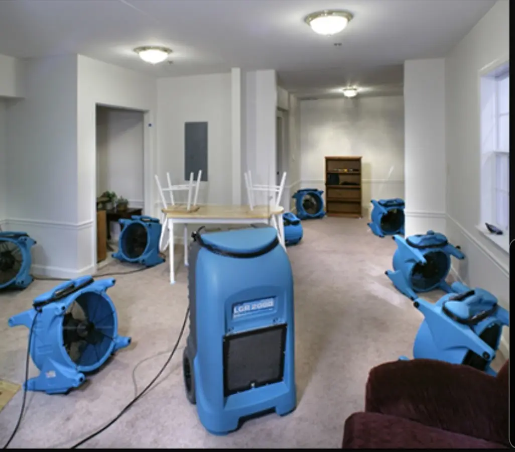 Air movers and dehumidifier setup for Water Damage Restoration in West Samoset